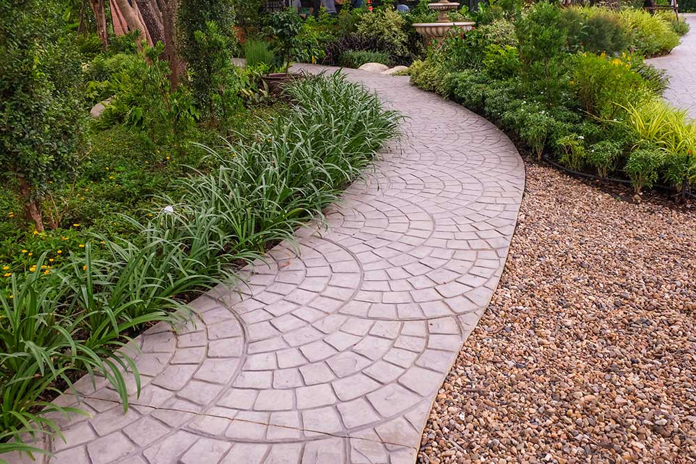 Picture of a pathway in landscaping designed for pet owners
